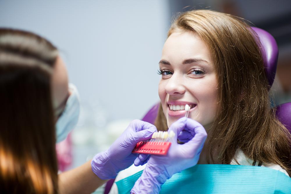 patient picking tooth whitening color | teeth whitening farmington hills mi