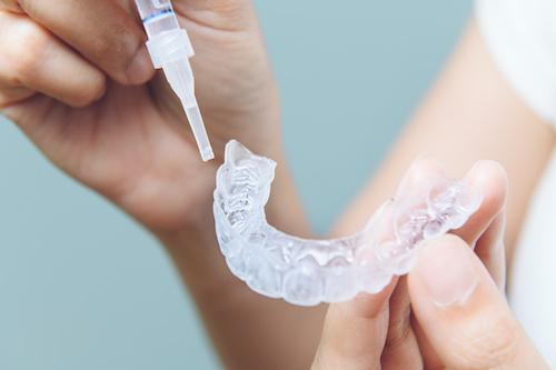 close up of clear plastic aligner | farmington hills mi dentist