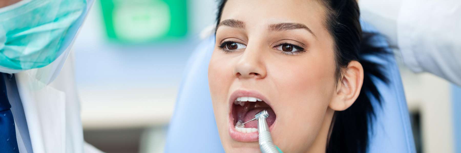 woman getting dentist exam | farmington hills dentist