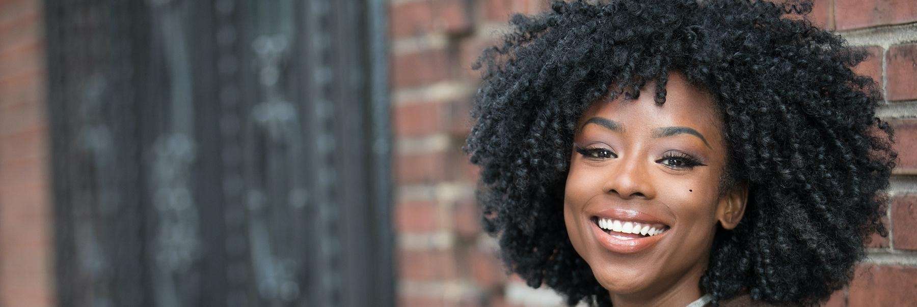 woman smiling | teeth whitening farmington hills mi